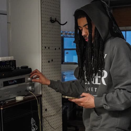 Bubba 3ig adjusting a receiver in the studio